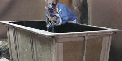 Metal tank being fabricated in the shop